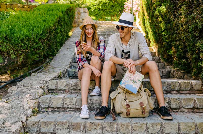 Couple sitting on stone steps