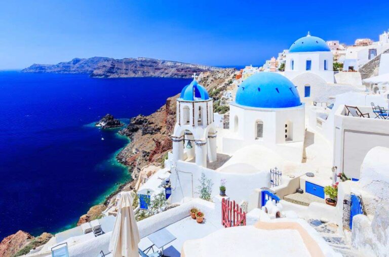 Blue and white houses near the sea in Santorini